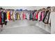 This closet offers ample storage space with many hanging rods for the storage of many clothing items at 1218 Lanier Springs Dr, Buford, GA 30518