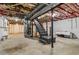 Basement with unfinished ceiling, exposed ductwork and staircase at 460 Stockwood Dr, Woodstock, GA 30188