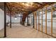 Spacious unfinished basement with stairs, utilities and visible ceiling insulation at 460 Stockwood Dr, Woodstock, GA 30188
