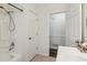 Bathroom with a shower/tub, white cabinets, and neutral paint at 460 Stockwood Dr, Woodstock, GA 30188