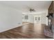 Open floor plan with hard wood flooring that joins this living room to a sunroom at 460 Stockwood Dr, Woodstock, GA 30188