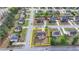 Aerial view of a home in a neighborhood, featuring a lawn with mature trees and a fenced yard at 9 Oatgrass Dr, Grayson, GA 30017