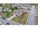 Aerial view of home with manicured lawn, mature trees, and well-kept landscaping at 9 Oatgrass Dr, Grayson, GA 30017
