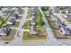 An aerial view shows this lovely single-Gathering home has a well-maintained lawn and a fenced backyard at 9 Oatgrass Dr, Grayson, GA 30017