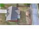 Aerial view of a fenced backyard with a patio and seating area in a residential area at 9 Oatgrass Dr, Grayson, GA 30017