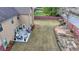 Backyard featuring a concrete patio with an outdoor seating area and a wooden fence at 9 Oatgrass Dr, Grayson, GA 30017
