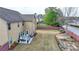 Large backyard featuring a concrete patio with outdoor seating area and a fenced yard at 9 Oatgrass Dr, Grayson, GA 30017