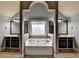 Elegant bathroom featuring a soaking tub, double vanity, and tiled floors at 9 Oatgrass Dr, Grayson, GA 30017