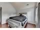 Inviting bedroom featuring a cozy bed, hardwood flooring, and ample natural light for a relaxing retreat at 9 Oatgrass Dr, Grayson, GA 30017