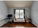 The bonus room is filled with musical instruments and provides lots of natural light at 9 Oatgrass Dr, Grayson, GA 30017