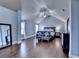 Spacious bedroom featuring vaulted ceilings, hardwood flooring and sitting area at 9 Oatgrass Dr, Grayson, GA 30017