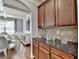 Butler's pantry and a glimpse of dining room at 9 Oatgrass Dr, Grayson, GA 30017