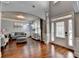 Bright living room featuring a neutral palette, hardwood floors, a large picture window and comfortable seating at 9 Oatgrass Dr, Grayson, GA 30017
