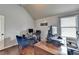 Functional home office with multiple desks, modern equipment, and natural light for a productive atmosphere at 9 Oatgrass Dr, Grayson, GA 30017