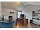 Bright home office features sleek desks, modern equipment, and ample workspace for productivity at 9 Oatgrass Dr, Grayson, GA 30017