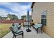 Cozy patio with outdoor furniture and umbrella, perfect for relaxing at 9 Oatgrass Dr, Grayson, GA 30017