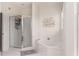 Clean bathroom with a glass-enclosed shower and a separate soaking tub at 951 Glenwood Se Ave # 3104, Atlanta, GA 30316