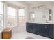 Bright bathroom with double vanity, elegant lighting, and modern fixtures at 951 Glenwood Se Ave # 3104, Atlanta, GA 30316