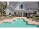 Aerial view of a large community pool with lounge chairs at 951 Glenwood Se Ave # 3104, Atlanta, GA 30316