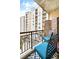 Relaxing balcony with comfortable seating, plants, and views of the surrounding building at 1101 Juniper Ne St # 922, Atlanta, GA 30309