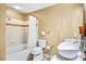 Well-lit bathroom with a sleek vanity, vessel sink, and tiled shower-tub combo at 1101 Juniper Ne St # 922, Atlanta, GA 30309