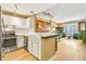 Charming kitchen boasting bright white cabinets, stainless steel appliances, and an open concept layout at 1101 Juniper Ne St # 922, Atlanta, GA 30309