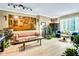 Bright living room with modern lighting, stylish decor, and a comfortable seating area at 1101 Juniper Ne St # 922, Atlanta, GA 30309