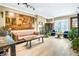 Inviting living room with beautiful decor, wood floors, and plenty of natural light at 1101 Juniper Ne St # 922, Atlanta, GA 30309