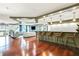 Elegant resident lounge with hardwood floors, contemporary furnishings, and a bar area at 1101 Juniper Ne St # 922, Atlanta, GA 30309