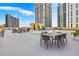 Stylish rooftop deck with outdoor dining and lounge furniture at 1101 Juniper Ne St # 922, Atlanta, GA 30309