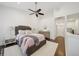 Spacious bedroom featuring vaulted ceiling, a ceiling fan, and hardwood floors at 1119 Glenridge Pl, Atlanta, GA 30342
