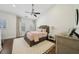 Serene bedroom featuring plush bedding, soft natural light, and ceiling fan at 1119 Glenridge Pl, Atlanta, GA 30342