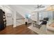 Comfortable living room with hardwood floors, stairs and lots of natural light at 1119 Glenridge Pl, Atlanta, GA 30342