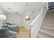 Cozy guest room with a comfortable daybed, stylish chair, and yellow rug at 1119 Glenridge Pl, Atlanta, GA 30342