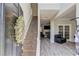Inviting foyer with hardwood floors, staircase and a view into the cozy living room with fireplace at 1312 Woodland View Rd, Lawrenceville, GA 30043