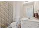 Bathroom with a toilet and shower/tub at 2565 Grapevine Cir # 103, Cumming, GA 30041