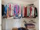 Organized closet with clothing racks, shelves, and various clothing items neatly displayed at 2565 Grapevine Cir # 103, Cumming, GA 30041