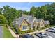 Inviting clubhouse with well-manicured landscaping and convenient parking at 2565 Grapevine Cir # 103, Cumming, GA 30041