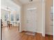 Bright and airy foyer with wood floors, leading into a naturally lit living area at 2565 Grapevine Cir # 103, Cumming, GA 30041