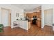 Well-lit kitchen with wood cabinets and stainless-steel appliances at 2565 Grapevine Cir # 103, Cumming, GA 30041