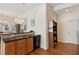 Bright kitchen features a breakfast bar and modern appliances at 2565 Grapevine Cir # 103, Cumming, GA 30041
