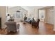 Spacious living room with vaulted ceilings, ceiling fan, and wood flooring at 2565 Grapevine Cir # 103, Cumming, GA 30041