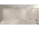 This bedroom offers neutral walls and carpeting plus natural light at 400 Surveyors Pt, Suwanee, GA 30024