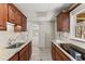 Kitchenette with granite countertops and stainless-steel appliances at 400 Surveyors Pt, Suwanee, GA 30024