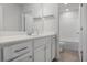Bathroom with a single vanity, drawers, mirror, and full bath with shower at 5 Dew Drop Pt, Dallas, GA 30157