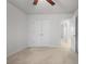This bedroom includes neutral walls, carpet, a ceiling fan, and a window at 5 Dew Drop Pt, Dallas, GA 30157