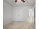 Carpeted bedroom with a closet, white walls, and natural light through a window at 5 Dew Drop Pt, Dallas, GA 30157