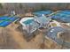 Aerial shot of community amenities including a pool, tennis courts, and clubhouse at 5 Dew Drop Pt, Dallas, GA 30157