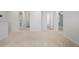 Open hallway featuring carpeted floor and neutral walls, connecting various rooms and living spaces of the house at 5 Dew Drop Pt, Dallas, GA 30157