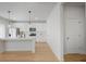 Bright, modern kitchen with stainless steel appliances, an island, and pendant lights at 5 Dew Drop Pt, Dallas, GA 30157